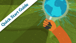 Hand holding a globe in a light bulb
